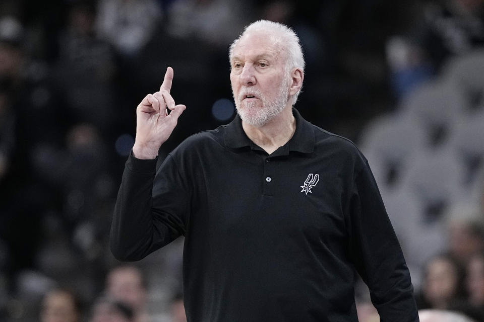 San Antonio Spurs head coach Gregg Popovich signals to his players during the first half of an NBA basketball game against the Orlando Magic in San Antonio, Wednesday, Jan. 31, 2024. (AP Photo/Eric Gay)