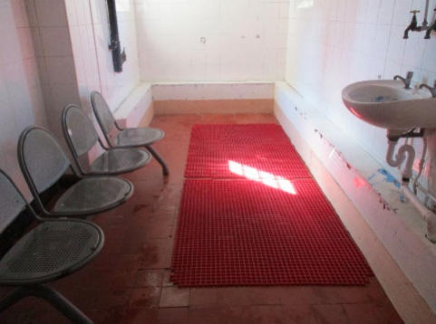 The shower areas in some parts of the prison were described as 