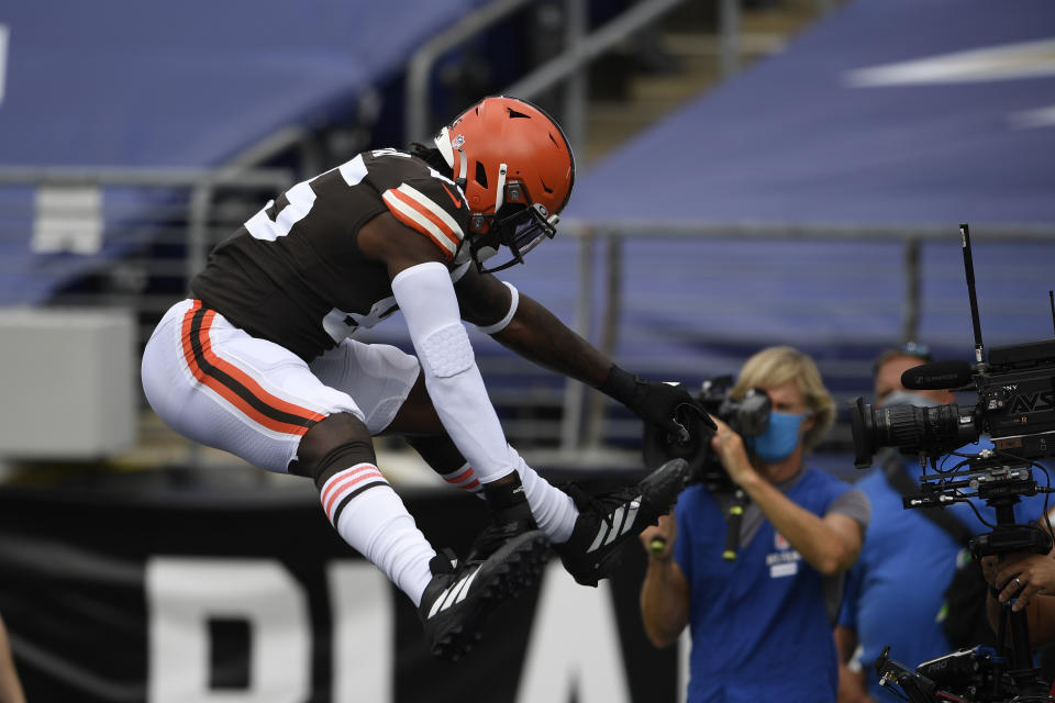 Cleveland Browns tight end David Njoku (85) jumps after scoring a touchdown, during the first half of an NFL football game against the Baltimore Ravens, Sunday, Sept. 13, 2020, in Baltimore, MD. (AP Photo/Nick Wass)