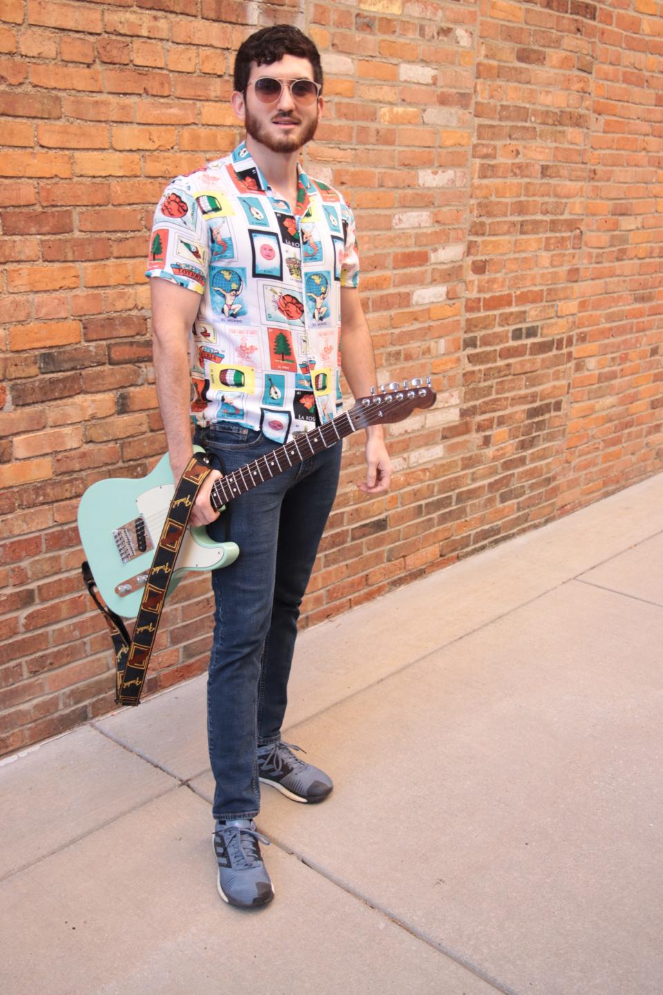 Musician Jonathan Crayne, pictured May 7 in Adrian, recently released his first CD, "Oknow." Crayne is a graduate of Adrian High School and Adrian College.