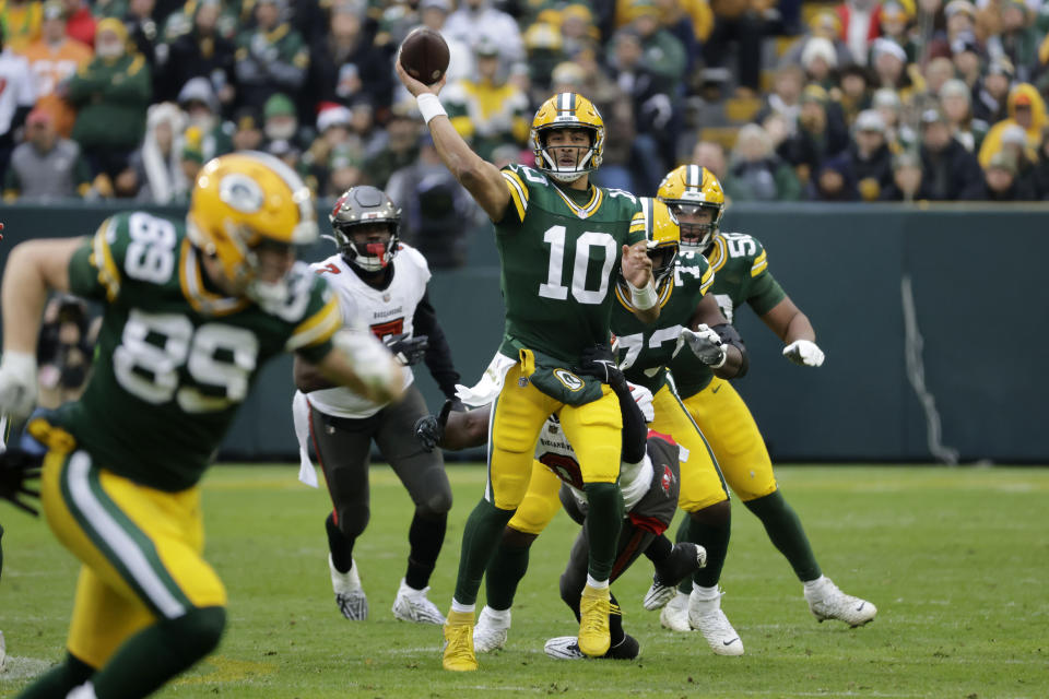 Green Bay Packers quarterback Jordan Love (10) throws a pass during the second half of an NFL football game against the Tampa Bay Buccaneers, Sunday, Dec. 17, 2023, in Green Bay, Wis. (AP Photo/Mike Roemer)