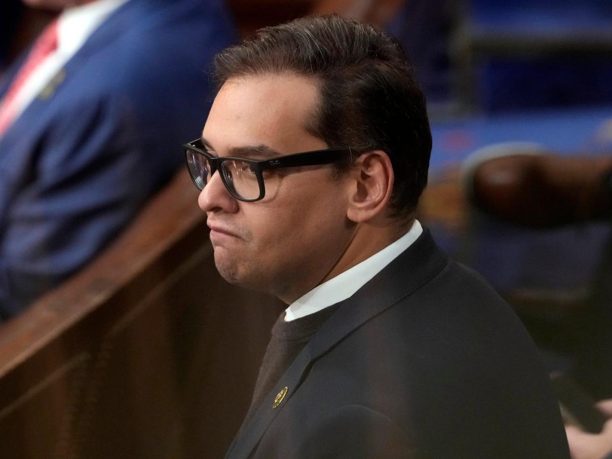 Rep.-elect George Santos, R-N.Y., stands during the 10 round of voting for speaker in the House chamber as the House meets for the third day to elect a speaker and convene the 118th Congress in Washington, Thursday, Jan. 5, 2023.