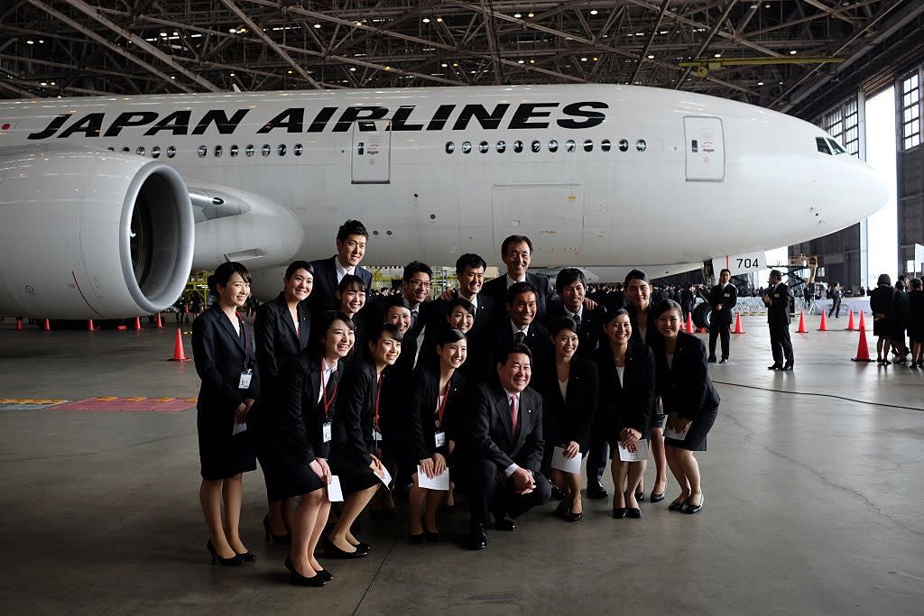 Japan Airlines cabin crew: AFP via Getty Images