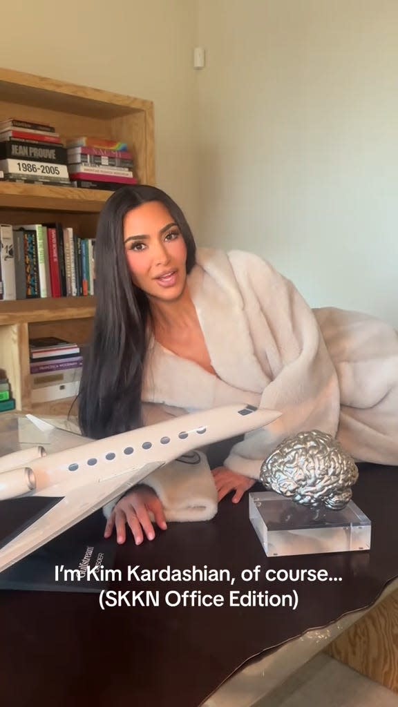 Kim Kardashian has 3D models of her brain and her plane on her desk.