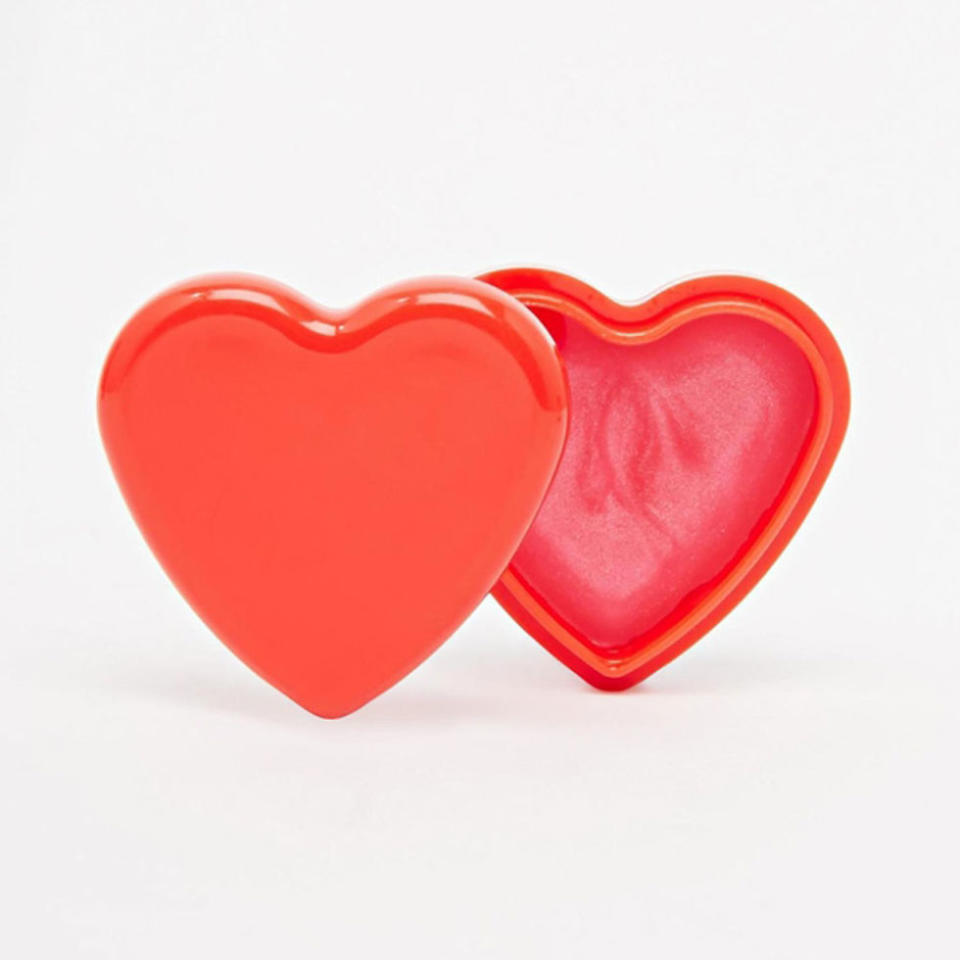 <p><a rel="nofollow noopener" href="http://www.asos.com/beauty-extras/heart-lip-balm/prod/pgeproduct.aspx?iid=4915129&clr=Heartlipbalm&SearchQuery=heart&pgesize=36&pge=1&totalstyles=84&gridsize=3&gridrow=7&gridcolumn=3" target="_blank" data-ylk="slk:Heart Lip Balm;elm:context_link;itc:0;sec:content-canvas" class="link "><i>Heart Lip Balm</i></a><i>, ASOS, $7</i></p>