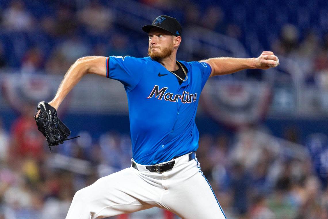 Miami Marlins pitcher A.J. Puk (35) throws the ball during the first inning of an MLB game on opening day against the Los Angeles Angels at LoanDepot Park in Miami, Florida, on Wednesday, April 3, 2024.