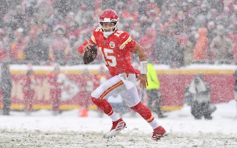 Kansas City Chiefs quarterback Patrick Mahomes (15) looks to pass during the second half against the Denver Broncos at Arrowhead Stadium - Credit: USA Today