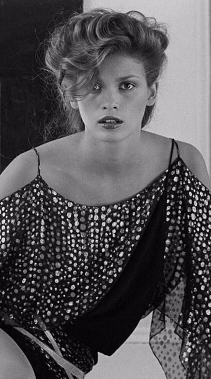 Carangi posing for a photo in front of a fire in the early '80s