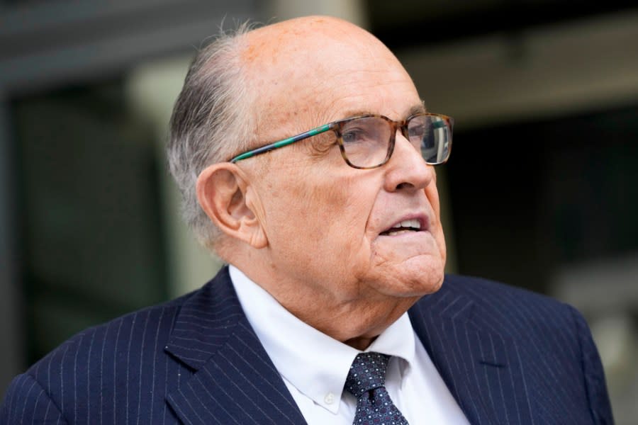 FILE – Rudy Giuliani speaks with reporters as he departs the federal courthouse, May 19, 2023, in Washington. (AP Photo/Patrick Semansky, File)