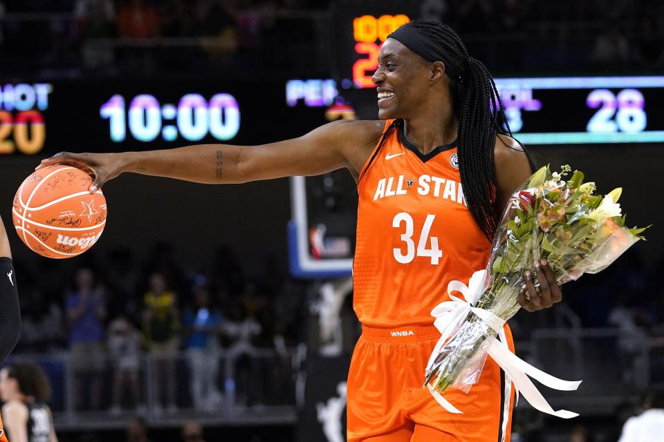 Team Wilson's Sylvia Fowles smiles as she walks to the bench during the first half of a WNBA All-Star basketball game against the Team Stewart in Chicago, Sunday, July 10, 2022. 