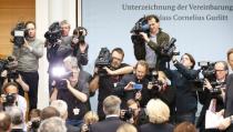 Journalists attend a news conference on the collection from the late Cornelius Gurlitt in Berlin November 24, 2014. REUTERS/Hannibal Hanschke