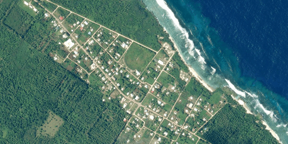 Images taken on Jan. 9 and on Jan. 17 show Tonga's Tongatapu island before and after the volcanic eruption. (Planet Labs PBC)