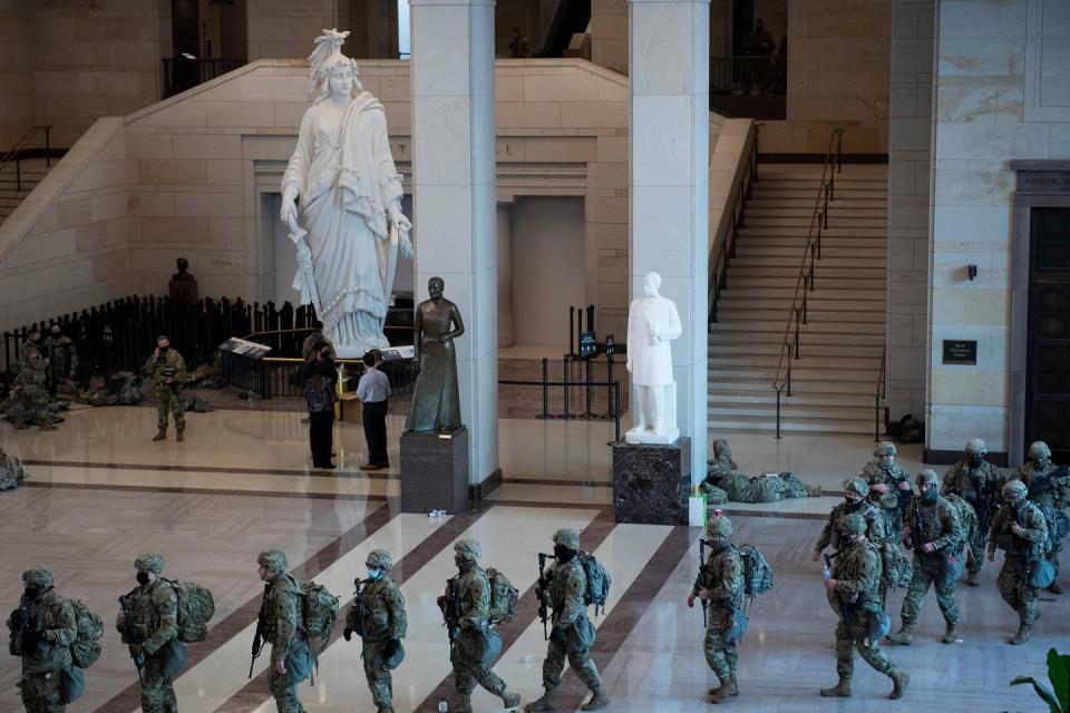 <p>Members of the National Guard deplaoy from the Capitol Visitors Center on Capitol Hill in Washington, DC, January 13, 2021.</p>