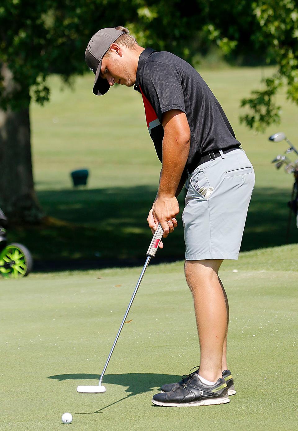 New London High School's Carter Eibel putts during the Simonson Golf Invite at Brookside Golf Course on Thursday, Aug. 5, 2021. TOM E. PUSKAR/TIMES-GAZETTE.COM