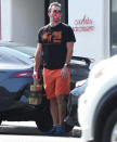 <p>Jon Hamm is seen wearing a Batman-inspired mask as he leaves an office building in Beverly Hills on Thursday.</p>