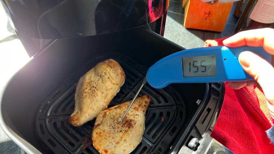 For the juiciest chicken breasts in an air fryer, stop the cooking when the chicken reaches 155°F and let carryover cooking take over.