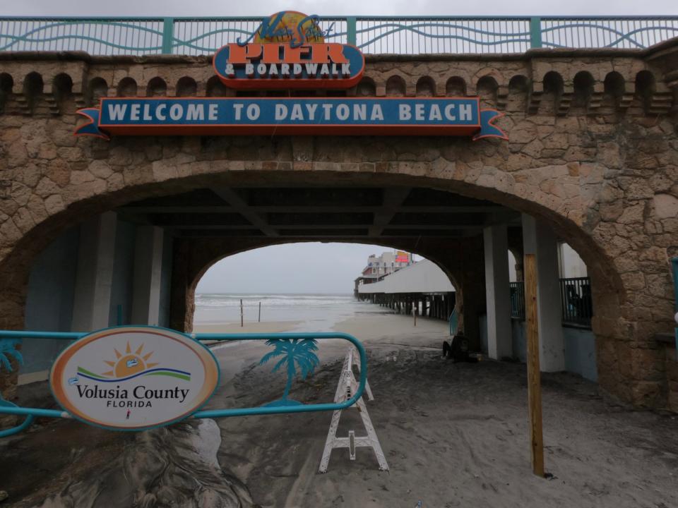 The landmark entrance to the World's Most Famous Beach was empty on Wednesday as the area faced winds and rain from Hurricane Idalia, the Category 3 storm that made landfall along the Big Bend area of Florida.