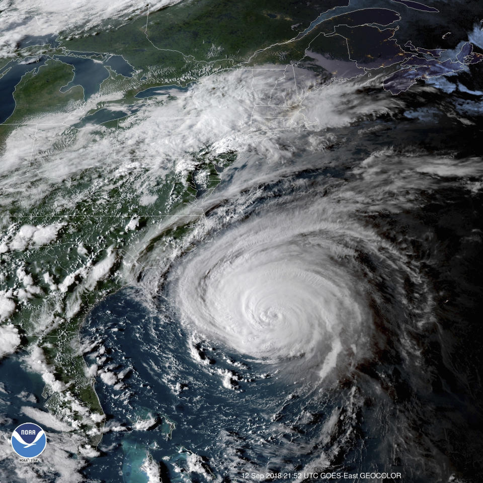 This enhanced satellite image made available by NOAA shows Hurricane Florence off the eastern coast of the United States on Wednesday, Sept. 12, 2018 at 5:52 p.m. EDT. (NOAA via AP)