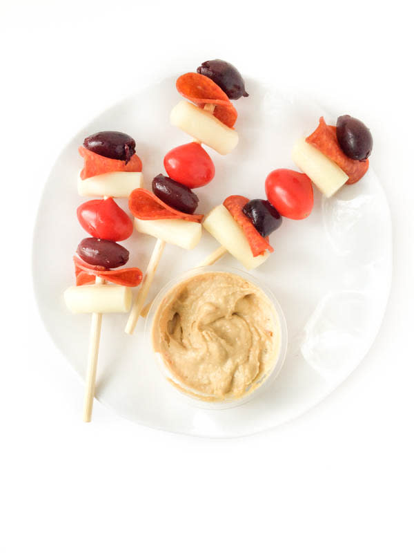 <p>The Lemon Bowl</p><p>These quick and easy no-cook Pizza Skewers only have five ingredients, taste just like the real thing and are ready in 10 minutes.</p><p><strong>Get the recipe: <a href="https://thelemonbowl.com/5-ingredient-pizza-skewers/" rel="nofollow noopener" target="_blank" data-ylk="slk:Deconstructed Pizza Skewers;elm:context_link;itc:0;sec:content-canvas" class="link rapid-noclick-resp">Deconstructed Pizza Skewers</a></strong></p>