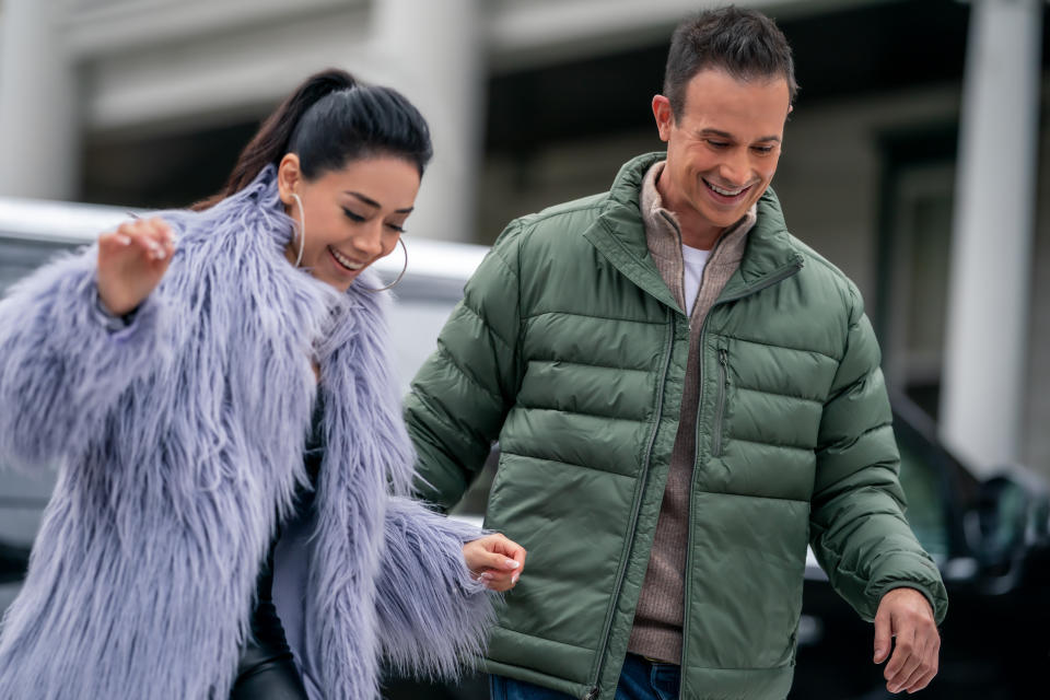 Aimee Garcia as Angelina and Freddie Prinze Jr as Miguel in Christmas With You. (Photo: Jessica Kourkounis/Netflix)