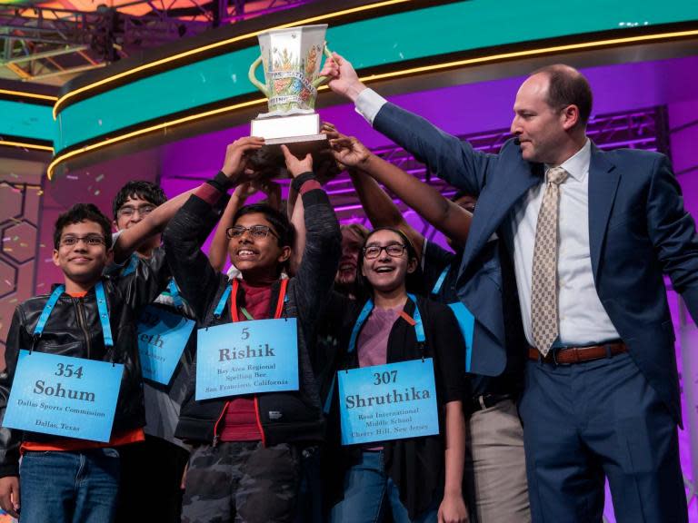 A superhuman group of adolescents broke the Scripps National Spelling Bee on Thursday, with eight contestants crowned co-champions after the competition said it was running out of challenging words.It was a stunning result, coming just after midnight, for the 92nd annual event, which has had six two-way ties but had never experienced such a logjam at the top.After the 17th round, Jacques Bailly, the event’s pronouncer, announced that any of the eight remaining contestants who made it through three more words would share in the prize.“We do have plenty of words remaining in our list, but we’ll soon run out of words that will challenge you,” Mr Bailly told the contestants at Gaylord National Resort & Convention Centre in National Harbour, Maryland.He added: “We’re throwing the dictionary at you. And so far, you are showing this dictionary who is boss.”None of the contestants faltered. They each got their own moment of triumph as they correctly spelled their words in the 20th round, then patiently sat back in their seats as the following contestants had their moments. They supported each other with high-fives and hugs, and each placed a hand on a single trophy.The champions were, along with the final words they spelled:Rishik Gandhasri, 13, of San Jose, California: auslaut.Erin Howard, 14, of Huntsville, Alabama: erysipelas.Saketh Sundar, 13, of Clarksville, Maryland: bougainvillea.Shruthika Padhy, 13, of Cherry Hill, New Jersey: aiguillette.Sohum Sukhatankar, 13, of Dallas: pendeloque.Abhijay Kodali, 12, of Flower Mound, Texas: palama.Christopher Serrao, 13, of Whitehouse Station, New Jersey: cernuous.Rohan Raja, 13, of Irving, Texas: odylic.The competition normally offers a $50,000 (£39,610) prize to the champion. Instead of splitting it eight ways, all eight contestants will receive $50,000 and their own trophies.There have been marathon spelling bees before — the 2017 event went 36 rounds, with two spellers battling it out after the 17th round — but the competition has never hosted such a large group of spellers who could not be defeated.The field is typically winnowed down to fewer than four by the 16th round.This year, the ninth-place finisher, 13-year-old Simone Kaplan of Davie, Florida, was thwarted in the 15th round.From that point on, the contestants correctly spelled 47 straight words.Already nervous, they started showing signs of fatigue as the competition stretched on past its expected window.At the beginning of the 17th round, Rishik had a question for Mr Bailly.“Out of curiosity, would you happen to know what time it is?” he asked. It was 11:18 pm.It was one of several moments of levity from a group of students who appeared largely unfazed by the pressure, with their parents in the audience often looking more unsettled.Rohan prompted laughter in the 17th round as he recoiled at his errant pronunciation of “Gaeltacht.”“Oh God,” he said, “I sound like I vomited.”The New York Times