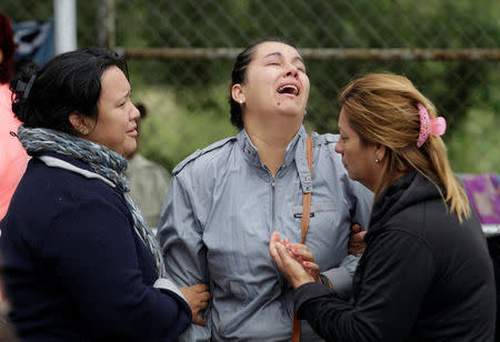 Relatives of inmates react outside the Cadereyta state prison after a riot broke out at the prison, in Cadereyta Jimenez, on the outskirts of Monterrey, Mexico October 11, 2017. REUTERS/Daniel Becerril