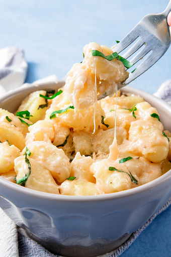 <p>Gnocchi isn't used enough and we are here to change that. It's such a quick pasta to make and this bake requires no pre-boiling which is always a win in my book. </p><p>Get the <a href="https://www.delish.com/uk/cooking/recipes/a32443437/four-cheese-gnocchi-bake-recipe/" rel="nofollow noopener" target="_blank" data-ylk="slk:Four-Cheese Gnocchi Bake;elm:context_link;itc:0;sec:content-canvas" class="link ">Four-Cheese Gnocchi Bake</a> recipe.</p>