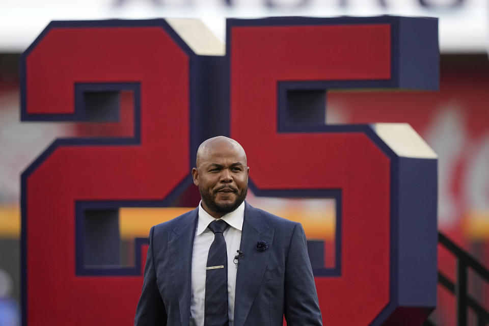 Andruw Jones walks on the field as he is honored, Saturday, Sept. 9, 2023, in Atlanta. Jones who won 10 Gold Gloves in a career that began with 12 seasons in Atlanta, became the 11th Braves player or manager to have his number retired on Saturday night. The honor could add momentum to his candidacy for the Baseball Hall of Fame. Jones' 25 was retired before the Braves' game against the Pittsburgh Pirates. (AP Photo/Brynn Anderson)