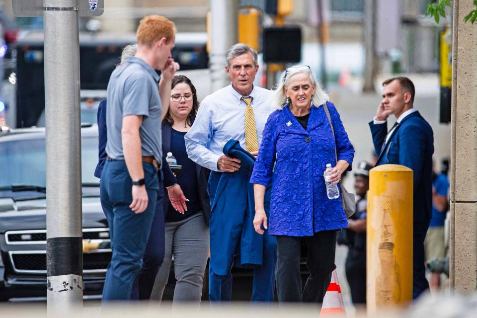 Gov. John Carney and First Lady Tracey Quillen Carney exit Vice President Kamala Harris' campaign engagement near West and 12th Streets in Wilmington, Monday, July 22, 2024. Harris visited Biden campaign headquarters inside the Brandywine Building for the engagement.