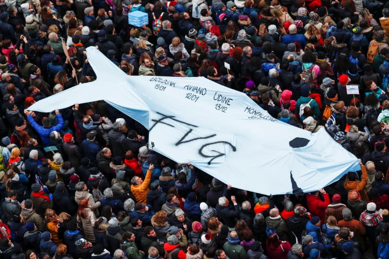 Protesters attend a demonstration held by "the sardines", a grassroots movement against far-right League leader Matteo Salvini, in Bologna