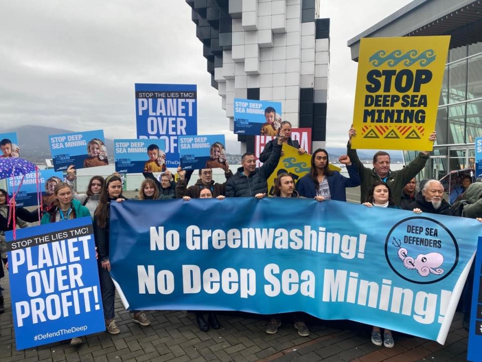 Protesters in Vancouver Saturday demand that delegates at the Fifth International Marine Protected Areas Congress, or IMPAC5, push for a moratorium on deep sea mining. (Janella Hamilton/CBC News - image credit)