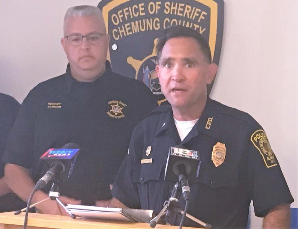 Former Elmira Police Chief Anthony Alvernaz briefs reporters Friday, Aug. 27, 2021 on the circumstances that led to the shooting death of reported parole absconder David G. Wandell earlier in the day. Looking on is Chemung County Sheriff Bill Schrom.