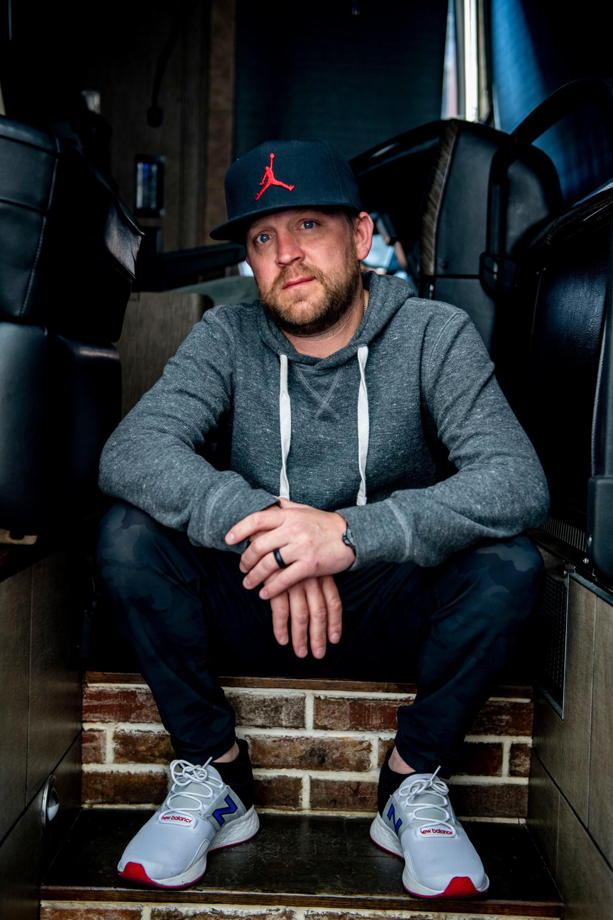 Justin Moore sits in his tour bus parked behind Red Door Saloon  in Nashville , Tenn., Thursday, May 4, 2023.