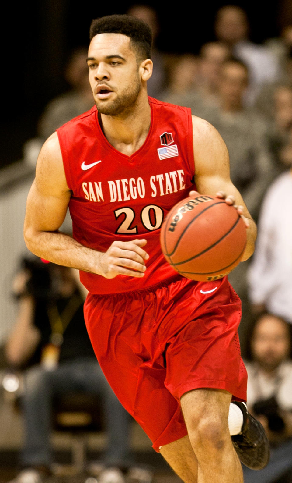 San Diego State forward JJ O’Brien (20) brings the ball down court during a mens NCAA basketball game against Wyoming on Tuesday, Feb. 11, 2014 at the Arena-Auditorium in Laramie, Wyo.(AP Photo/Jeremy Martin)