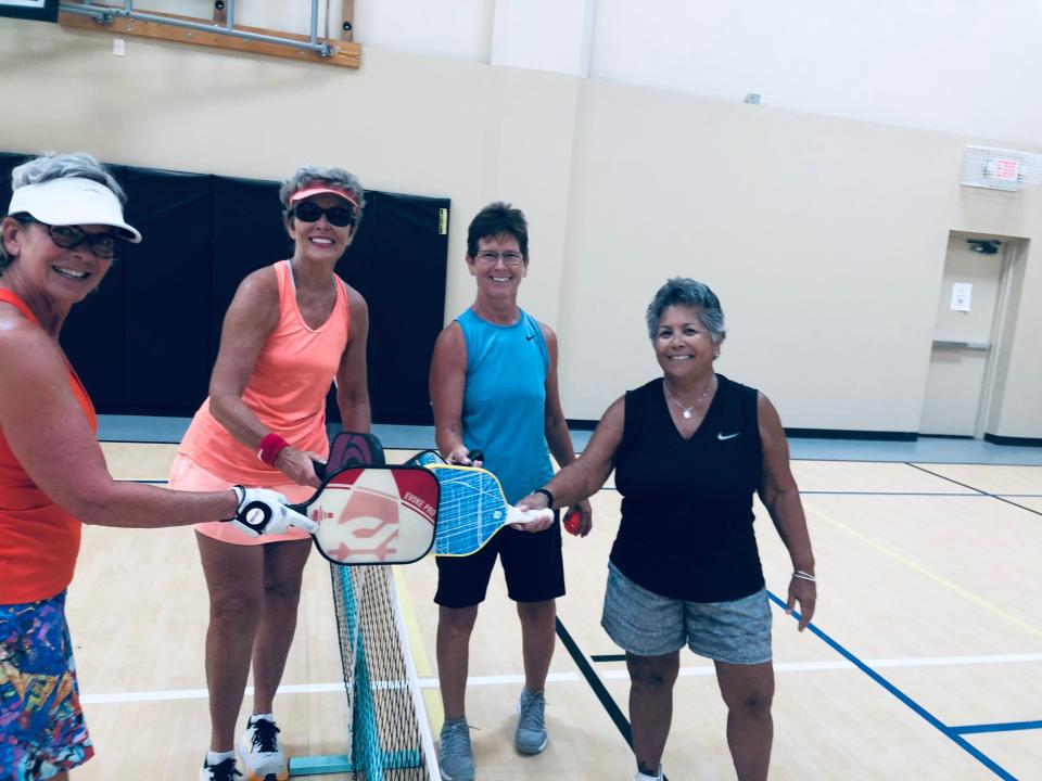 Pickleball players compete in a round robin tournament in Palm Desert on June 5, 2022. During the competition, one player had a medical emergency, and others came to her aid.