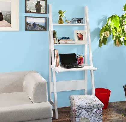 This decorative shelving ladder also has a built-in workspace