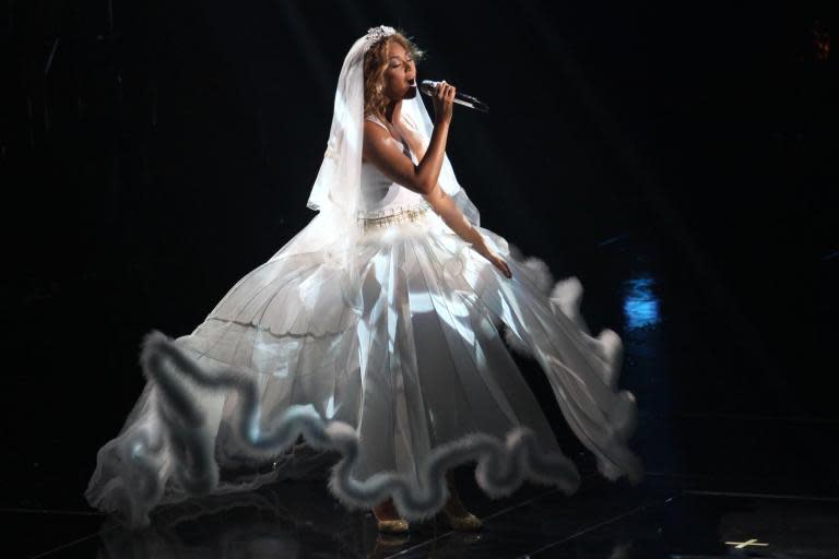 Beyonce's wedding vow renewal dress: Star reveals the couture look she wore for a ceremony with Jay-Z
