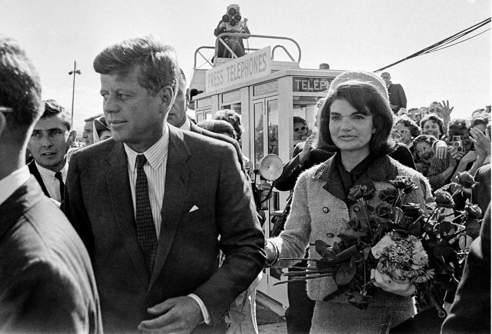 President John F. Kennedy and first lady Jacqueline Kennedy are greeted by an enthusiastic crowd upon their arrival at Dallas Love Field on Nov. 22, 1963, only a few hours before he was assassinated.