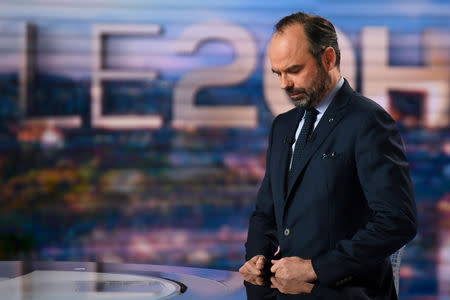 French Prime Minister Edouard Philippe poses as he makes "public order" announcements in the face of recent violent situations involving the Yellow Vest 'Gilets Jaunes' protestors across France, at the French TV channel TF1 studios in Boulogne-Billancourt, near Paris, France January 7, 2019. Eric Feferberg/Pool via REUTERS