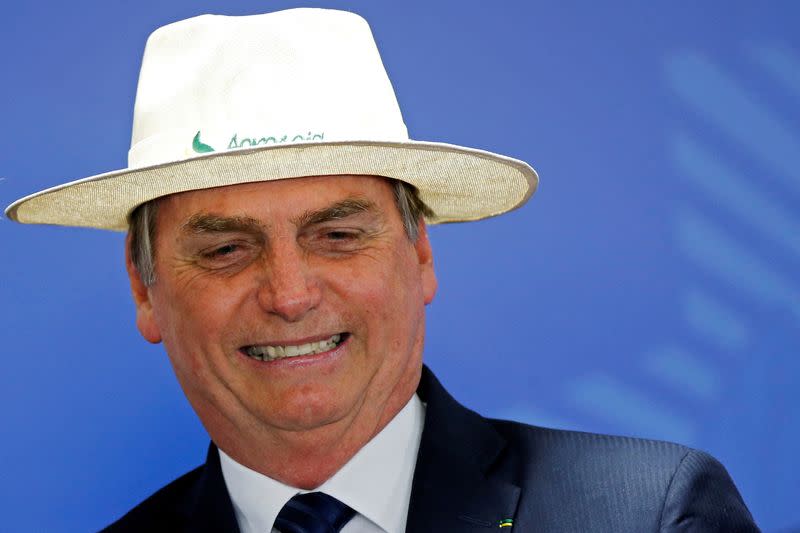 Imagen de archivo del presidente de Brasil, Jair Bolsonaro, reaccionando durante una ceremonia de toma de posesión del nuevo presidente del Banco Nacional de Desarrollo de Brasil (BNDES) en el Palacio de Planalto en Brasilia