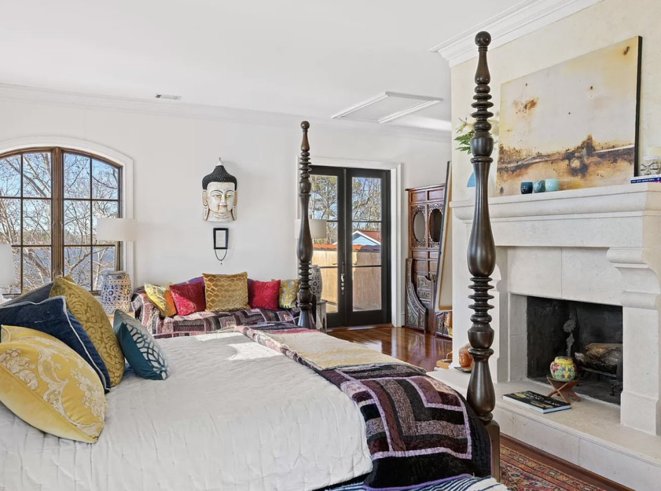 The house has two fireplaces including this one in the primary bedroom suite. Ellis Creek Photography/provided