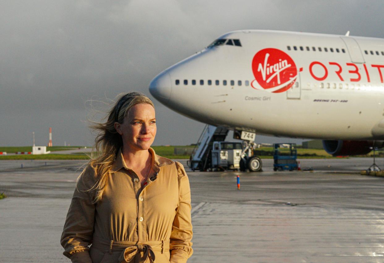 Melissa Thorpe, Head of Spaceport Cornwall, poses in front of Cosmic Girl, the modified Boeing 747 on November 08, 2022 in Newquay, England.