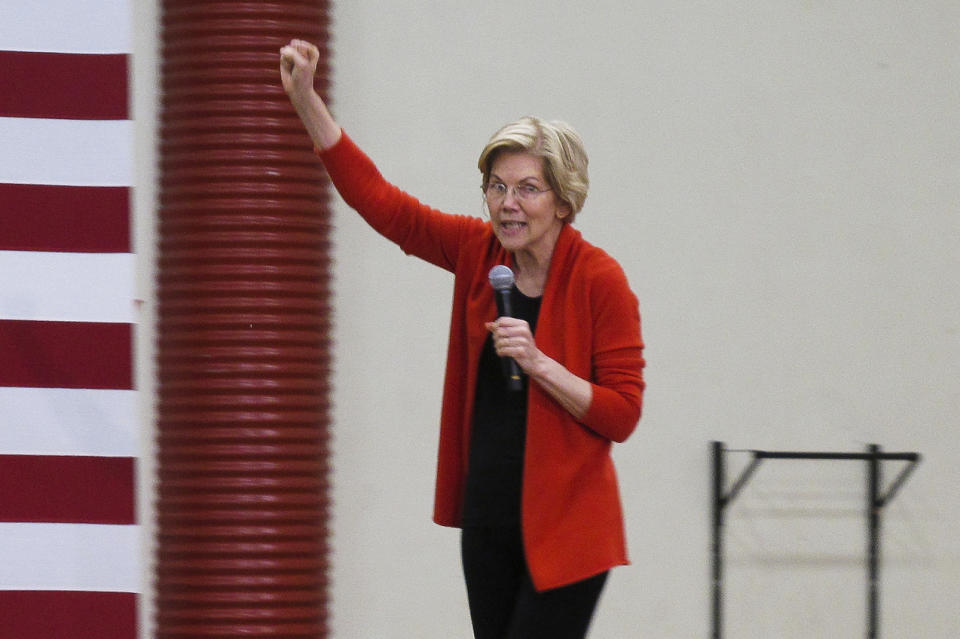 Sen. Elizabeth Warren, D-Mass., speaks to hundreds of supporters at a rally at Wooster High School in Reno, Nev., Saturday, April 6, 2019. Warren said a system that rewards the rich and powerful at the expense of working Americans is at the core of every problem facing the nation. (AP Photo/Scott Sonner)
