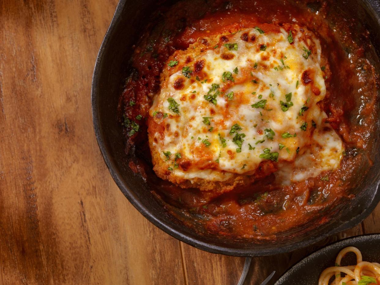 Chicken Parmesan Baked in Tomato Sauce with Spaghetti Mozzarella Cheese- Photographed on a Hasselblad H3D11-39 megapixel Camera System