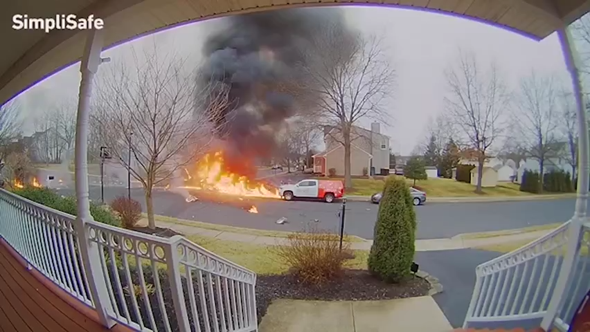 This doorbell camera video, provided by Hilltown resident Monica Rush, shows the chaotic moments after a plane crashed in her neighborhood Thursday, Feb. 24, 2022.