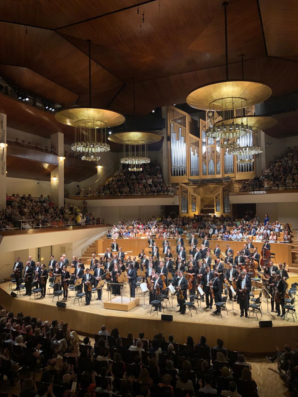 The Vienna Symphony Orchestra takes its bows at the Auditorio Nacional de Música.