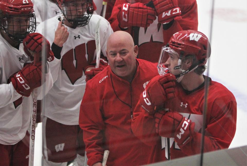 Wisconsin men's hockey coach Mike Hastings guides the team through practice at La Bahn Arena in Madison. In a preseason poll of Big Ten coaches, Wisconsin was picked to finish fifth out of seven teams.