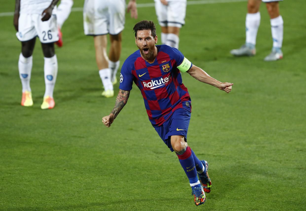 Lionel Messi scored a brilliant goal against Napoli and also drew a penalty as Barcelona advanced to the Champions League quarterfinals. (AP Photo/Joan Monfort)