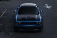 <p>While <a href="https://www.roadandtrack.com/new-cars/first-drives/a10324196/2018-dodge-challenger-srt-demon-first-drive/" rel="nofollow noopener" target="_blank" data-ylk="slk:the Dodge Challenger Demon;elm:context_link;itc:0;sec:content-canvas" class="link ">the Dodge Challenger Demon</a> has gone auto-only for the sake of quarter-mile times, <a href="https://www.roadandtrack.com/new-cars/first-drives/reviews/a8362/2015-dodge-challenger-srt-hellcat-review-first-drive/" rel="nofollow noopener" target="_blank" data-ylk="slk:the original Hellcat;elm:context_link;itc:0;sec:content-canvas" class="link ">the original Hellcat</a> can be had with a manual transmission behind the 717-horsepower supercharged V-8 engine. <a href="https://www.ebay.com/itm/2019-Dodge-Challenger/274353634606?hash=item3fe0c03d2e:g:qZgAAOSwe-herITZ" rel="nofollow noopener" target="_blank" data-ylk="slk:This one;elm:context_link;itc:0;sec:content-canvas" class="link ">This one</a> is lightly used, and it's painted in a lovely shade of dark grey. </p>