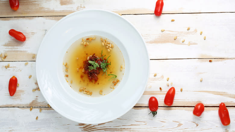 Tomato water with pine nuts